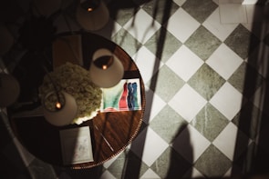 Top view of a custom epoxy table featuring a delicate flower bouquet encapsulated in resin.