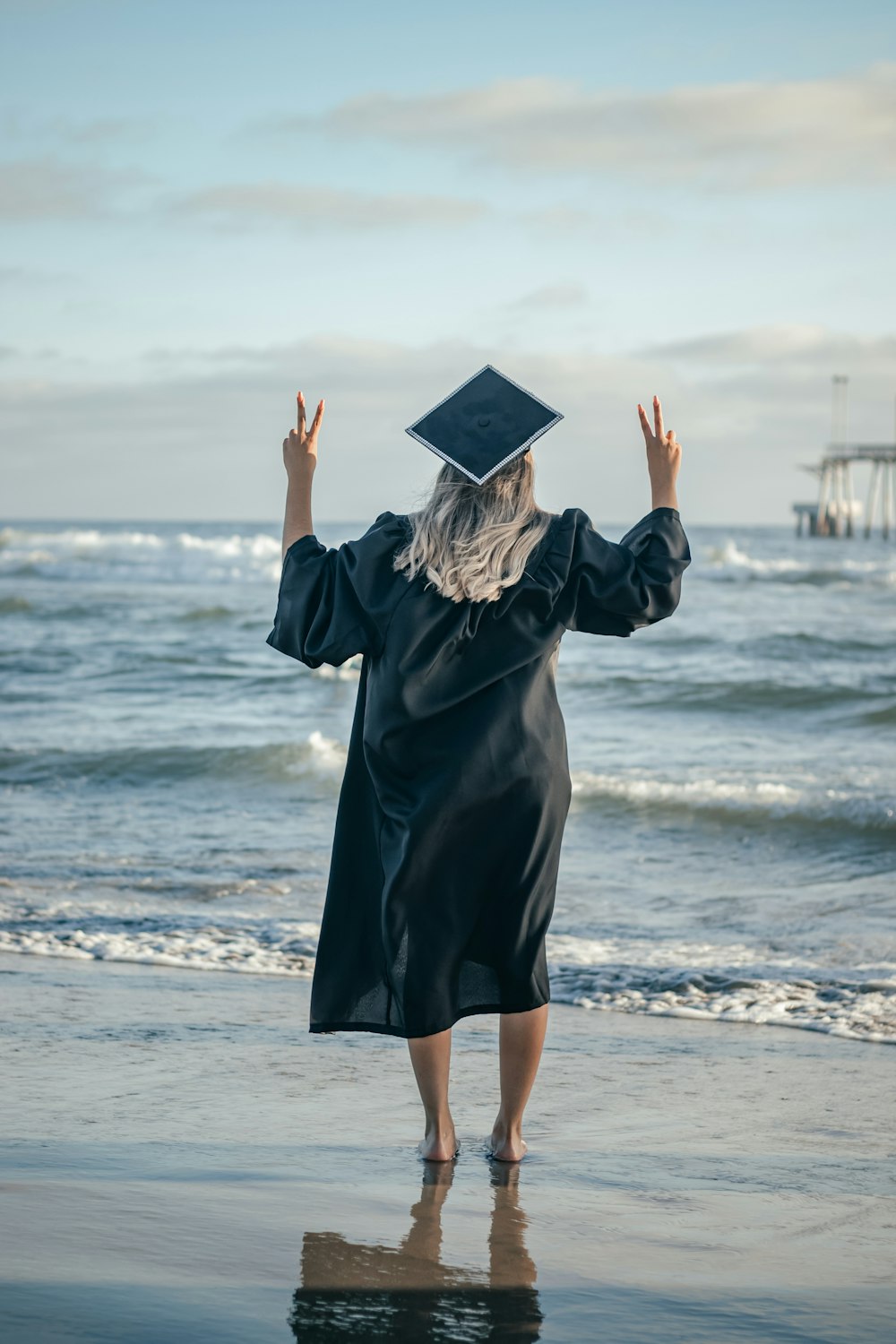 a person in a garment on a beach