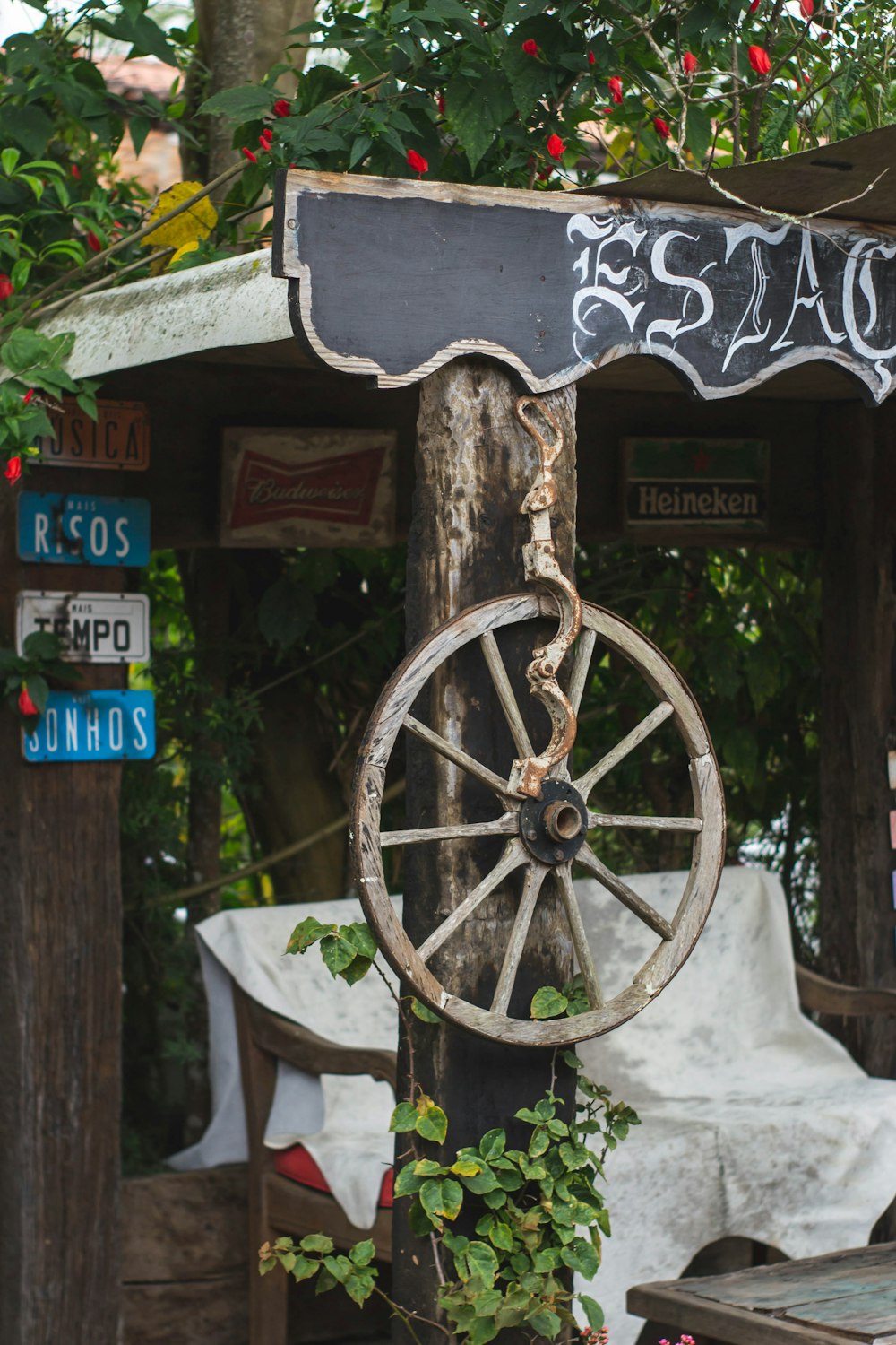 a wooden carriage with a wooden wheel