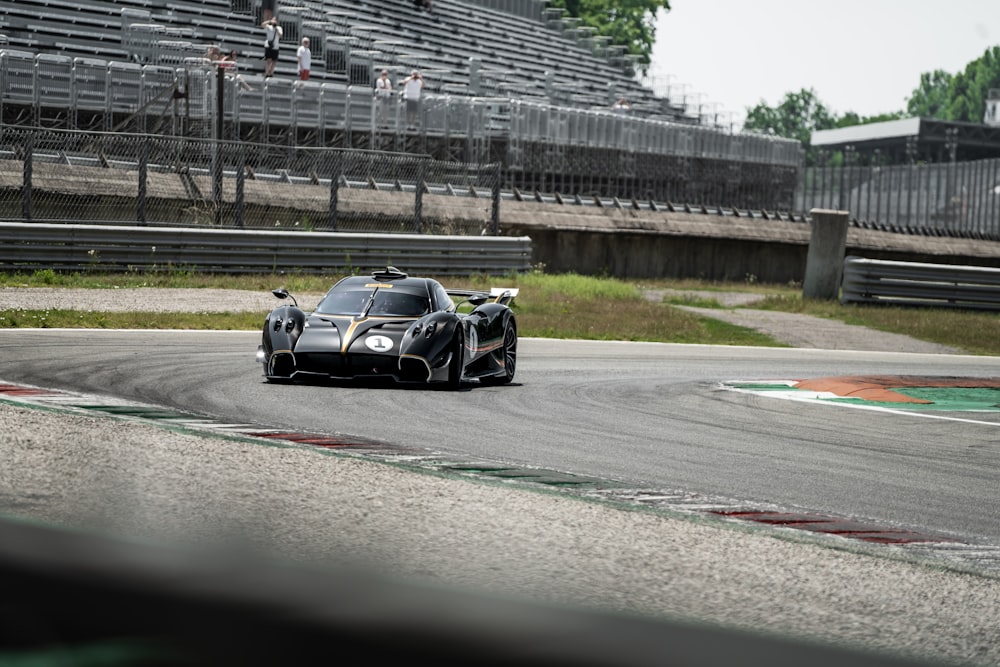 a black car on a race track