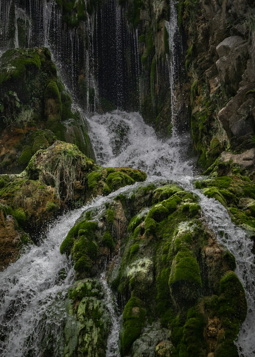 a waterfall in a rocky place