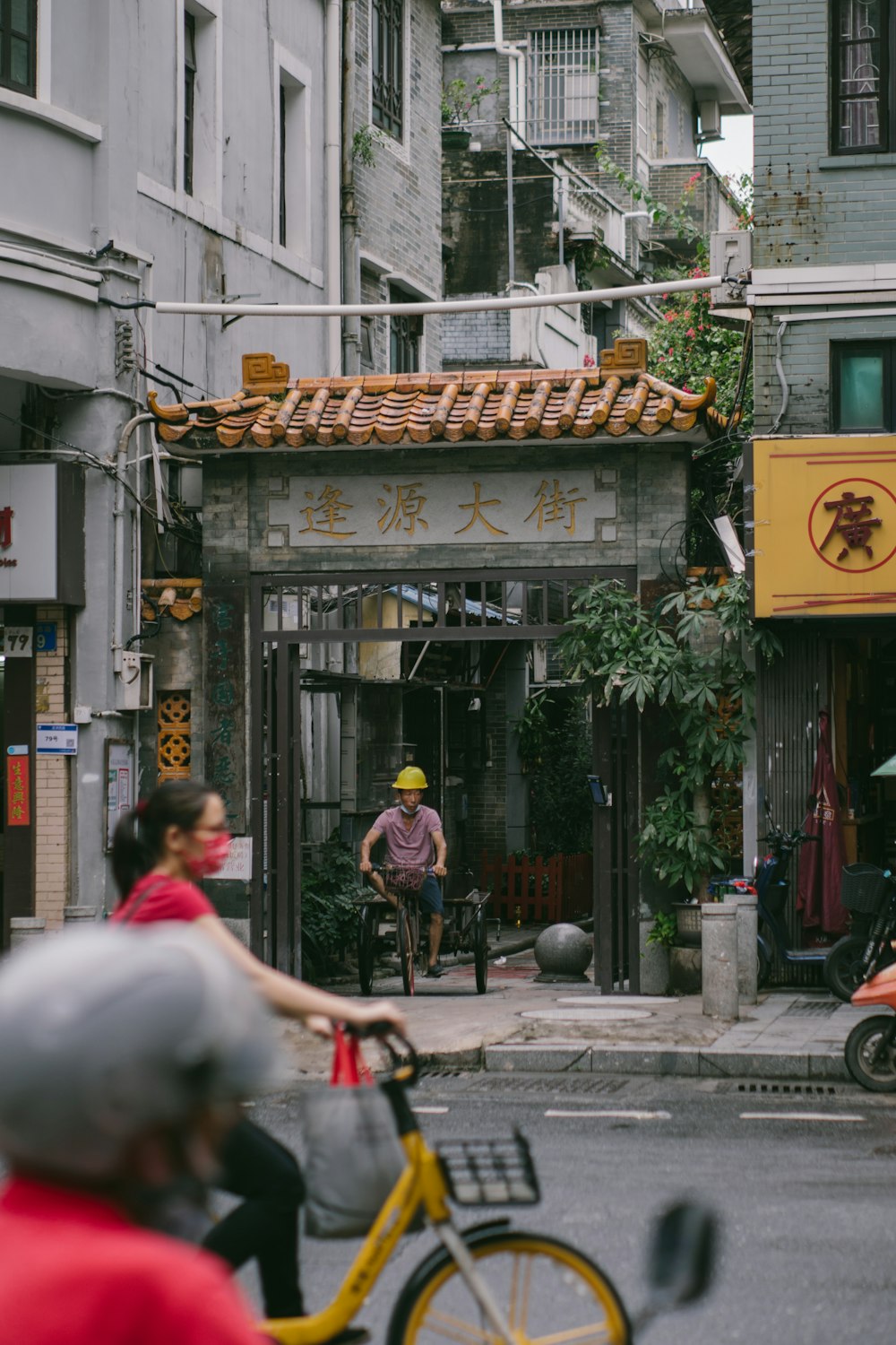 a group of people walking down a street