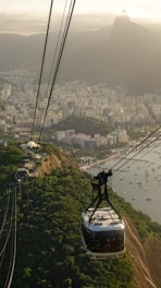 a cable car above a city