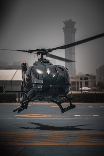 a helicopter on a runway