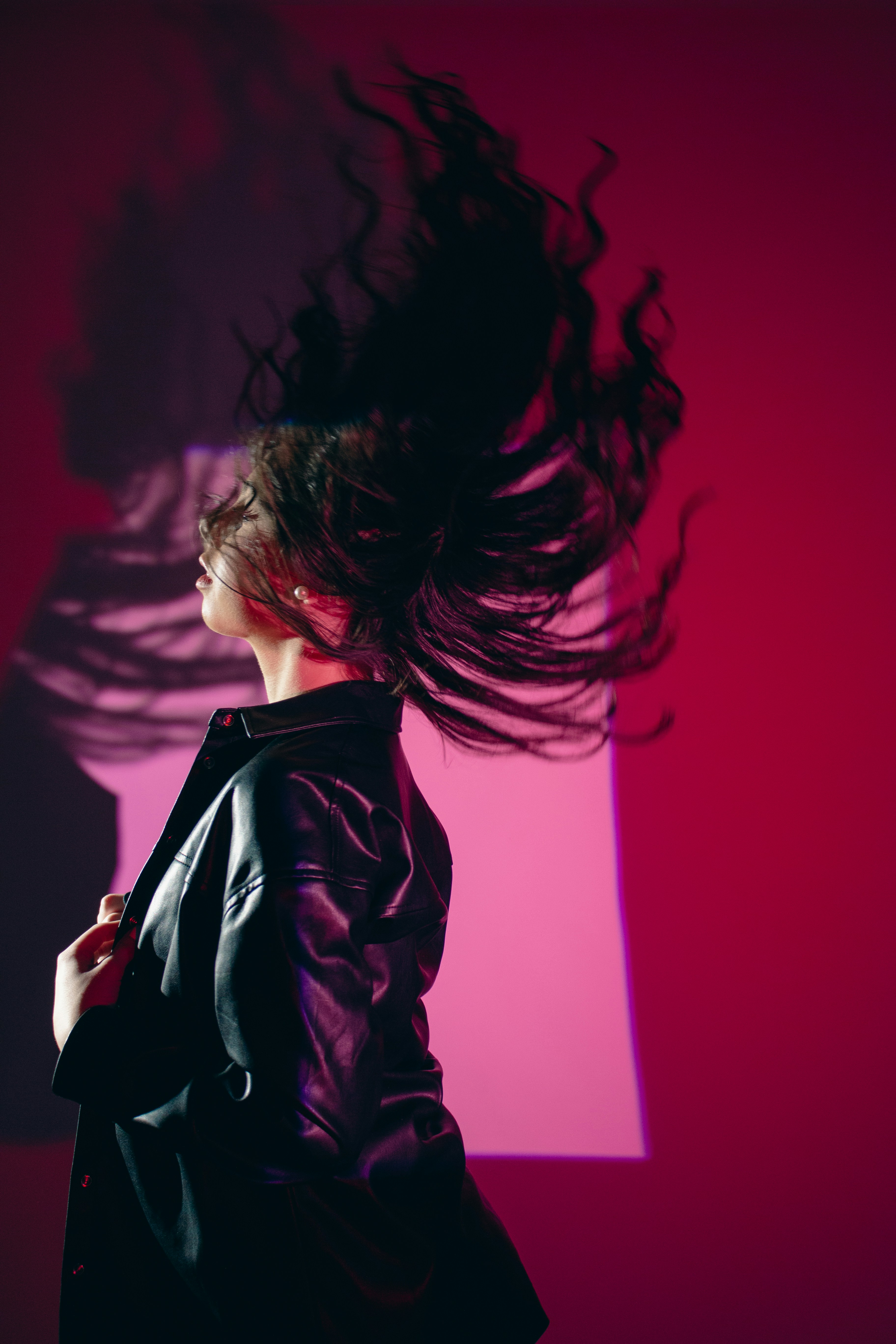 a person with a red light behind them