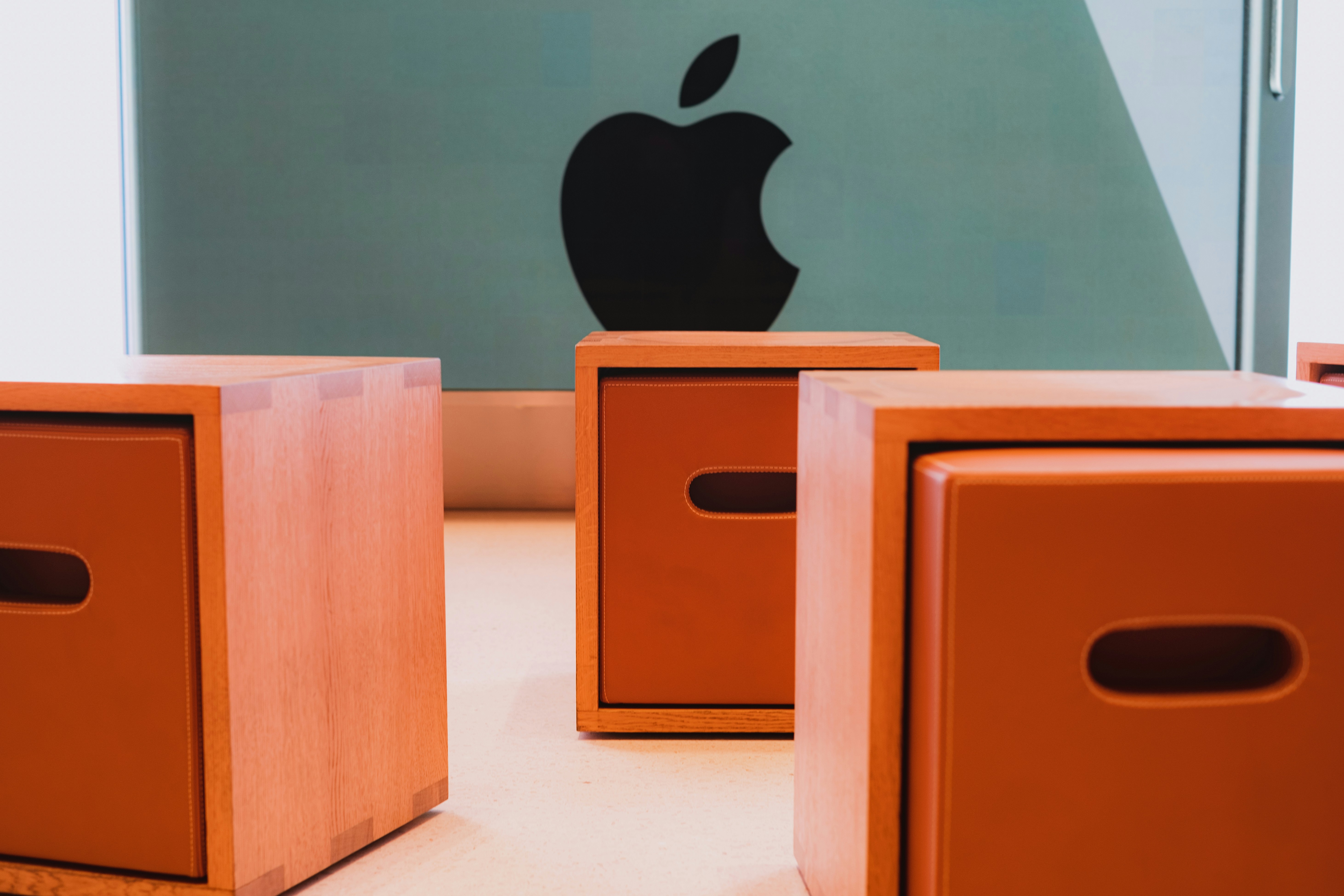a room with desks and a chalkboard
