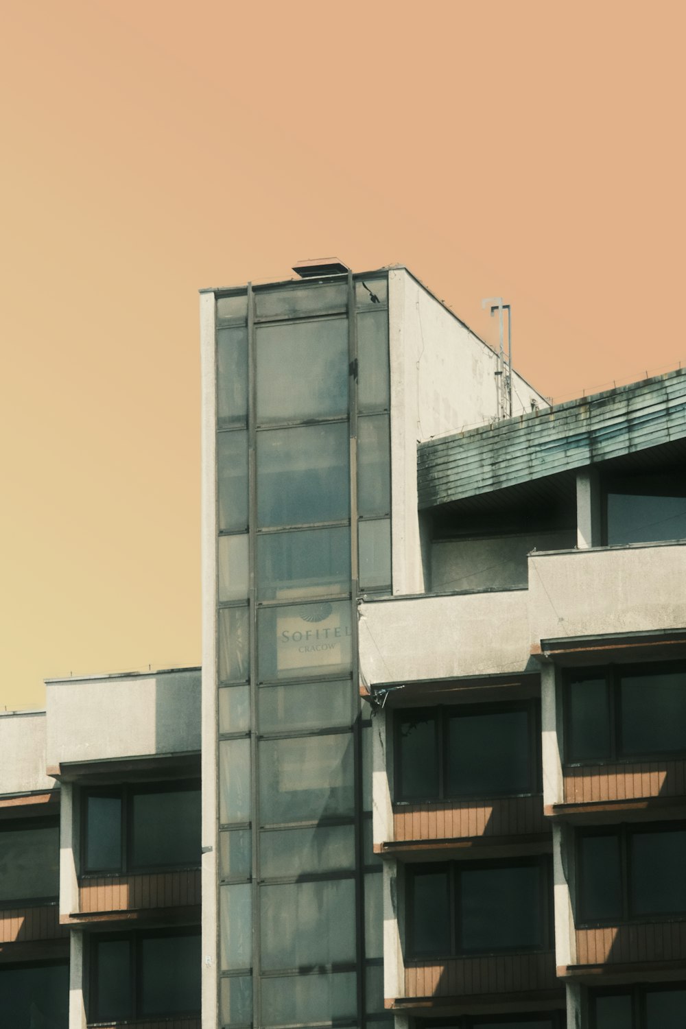 a tall building with a sign on it