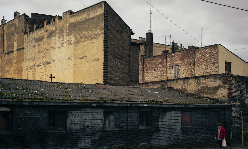 a person walking by a building