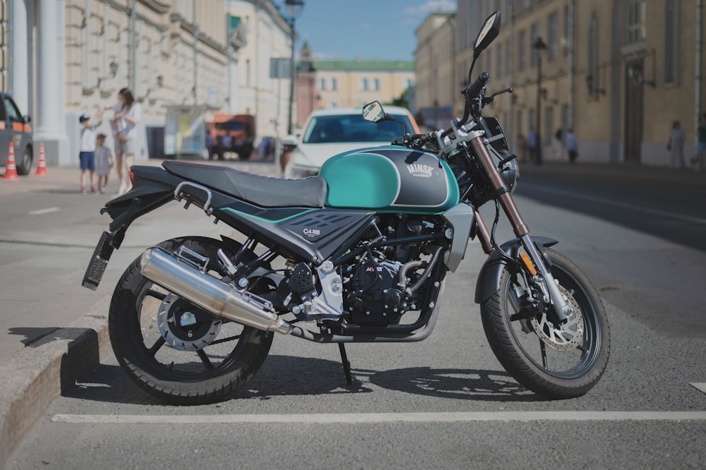 a motorcycle parked on the side of a street