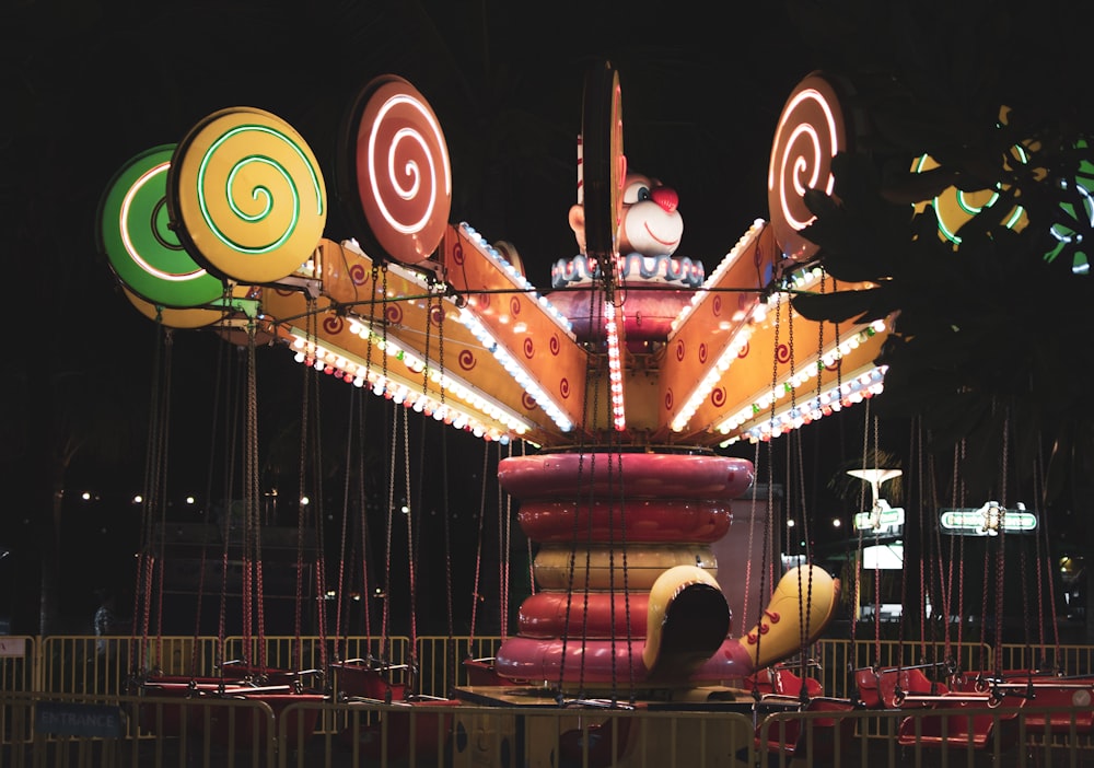 a large red and white ferris wheel