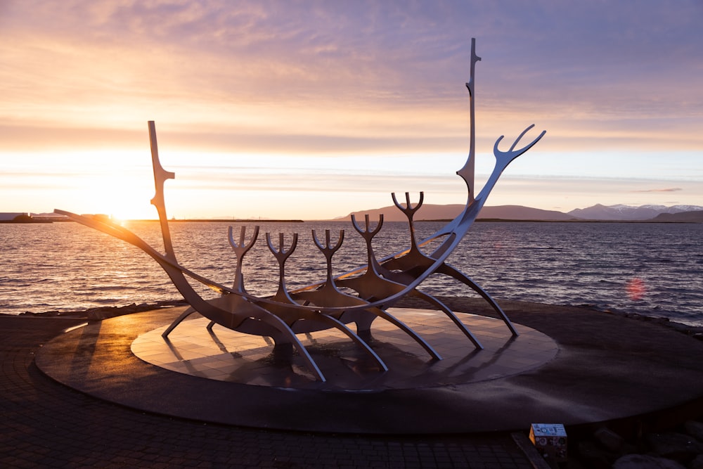 a sculpture on a dock