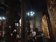 Cozy interior view of Ganesha Palace with warm lighting and intricate decor.