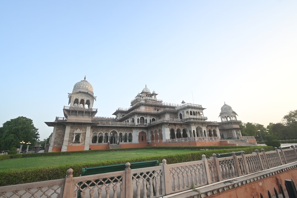 a large building with a dome and towers