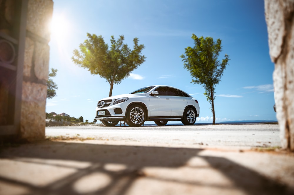 a white car parked on a road