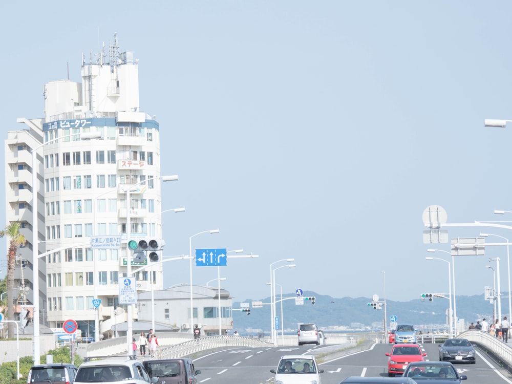 a city street with cars and buildings