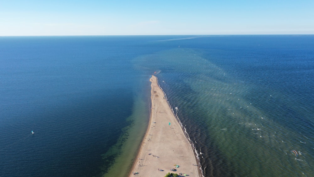 a beach with a body of water