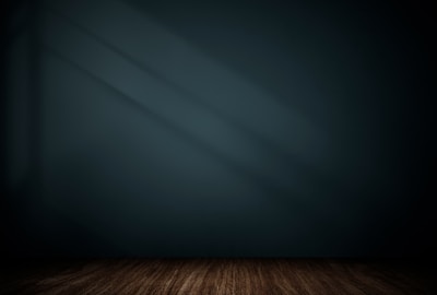 Softly lit modern therapy room with teal and blue accents reflecting calm and trust.