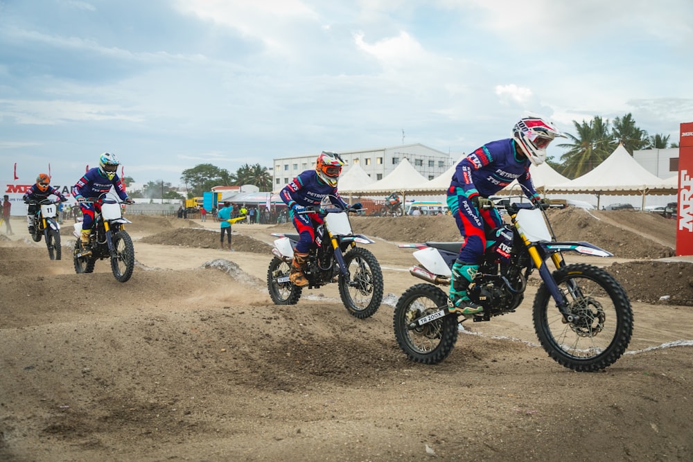 a group of people riding motorcycles