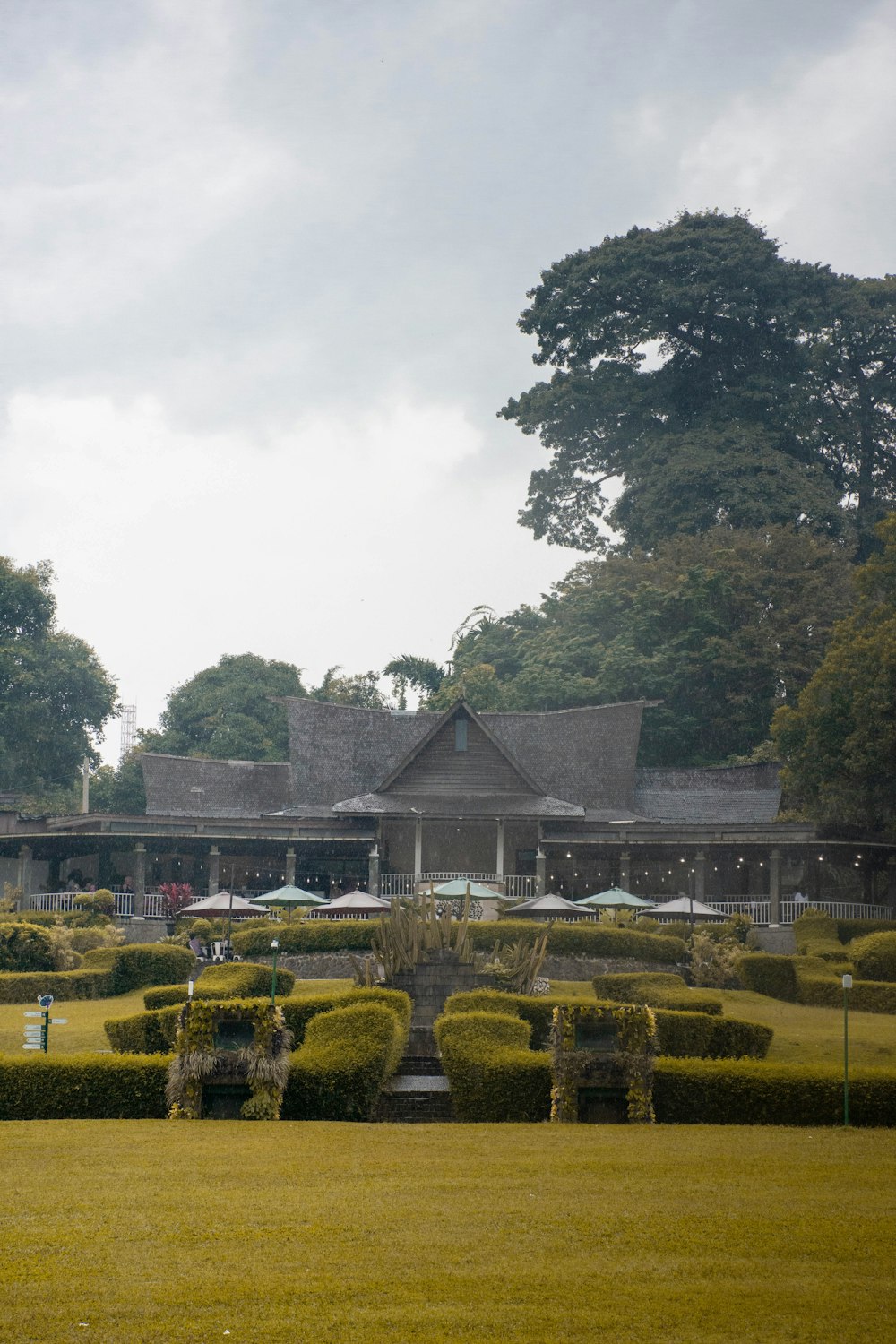 a building with trees in the back