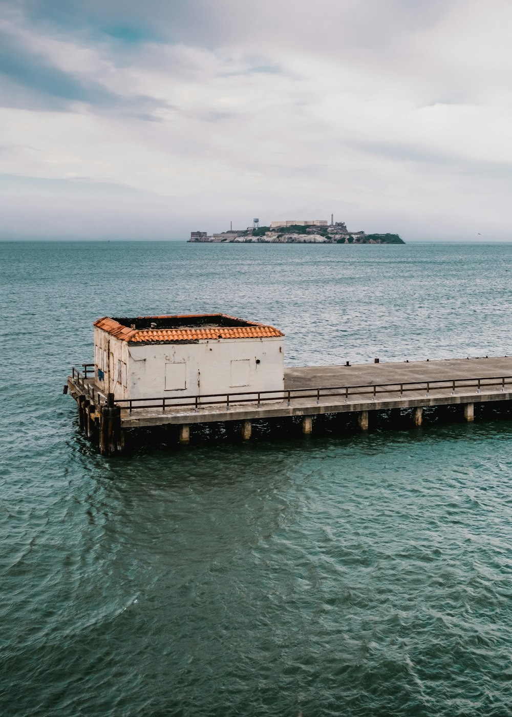 a structure on a dock in the water