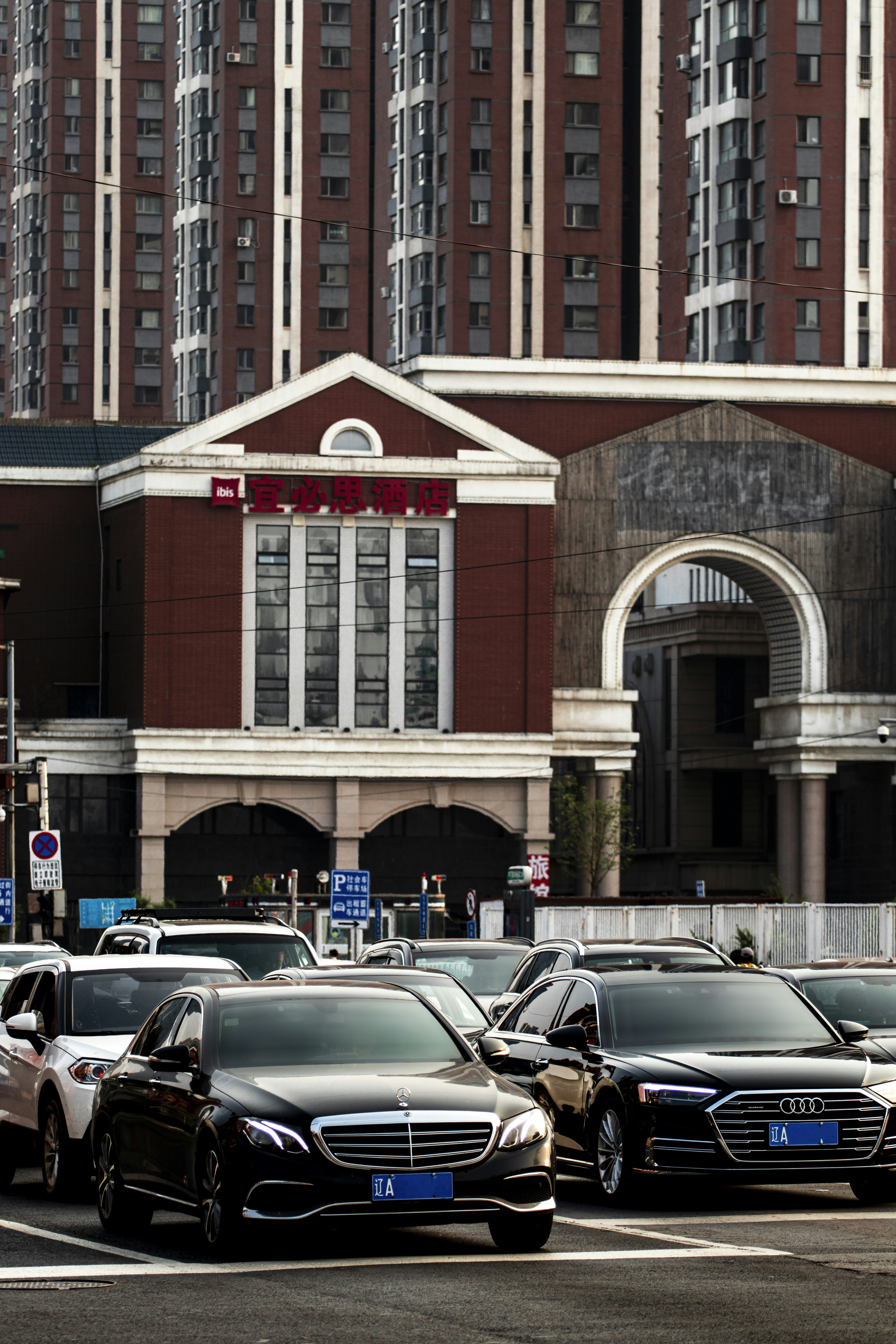 cars parked in front of a building