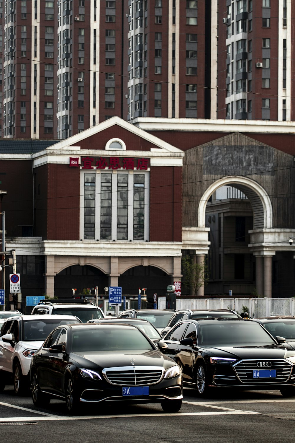 cars parked in front of a building