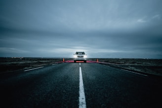 a truck driving down a road
