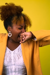 a person with the hand on the face