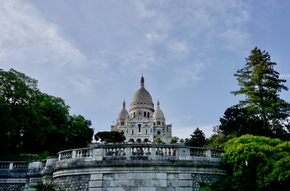 a bridge leading to a large building