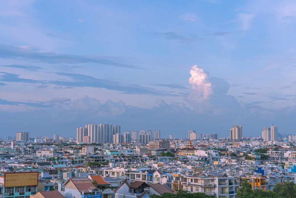 a city with a cloud in the sky