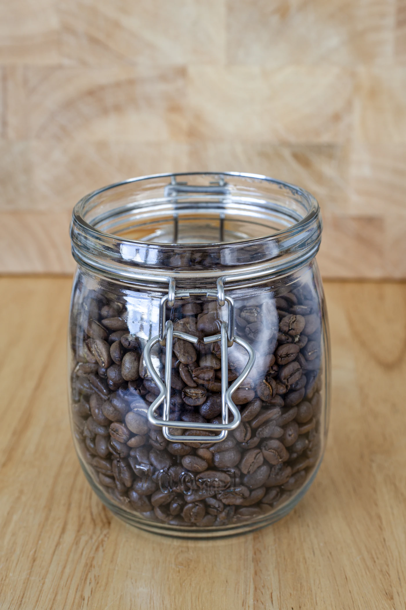 Jar of whole coffee beans