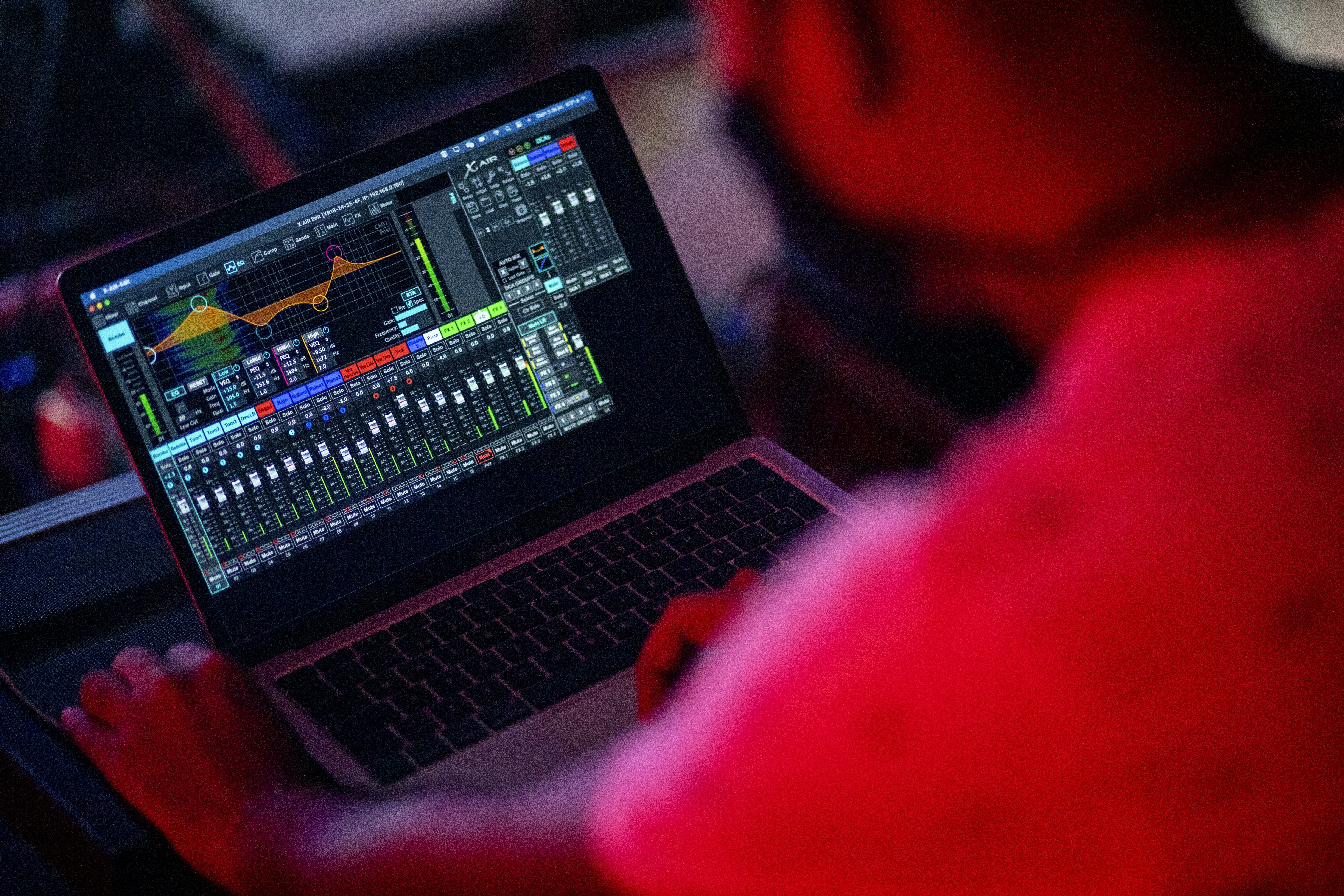 a person holding a laptop