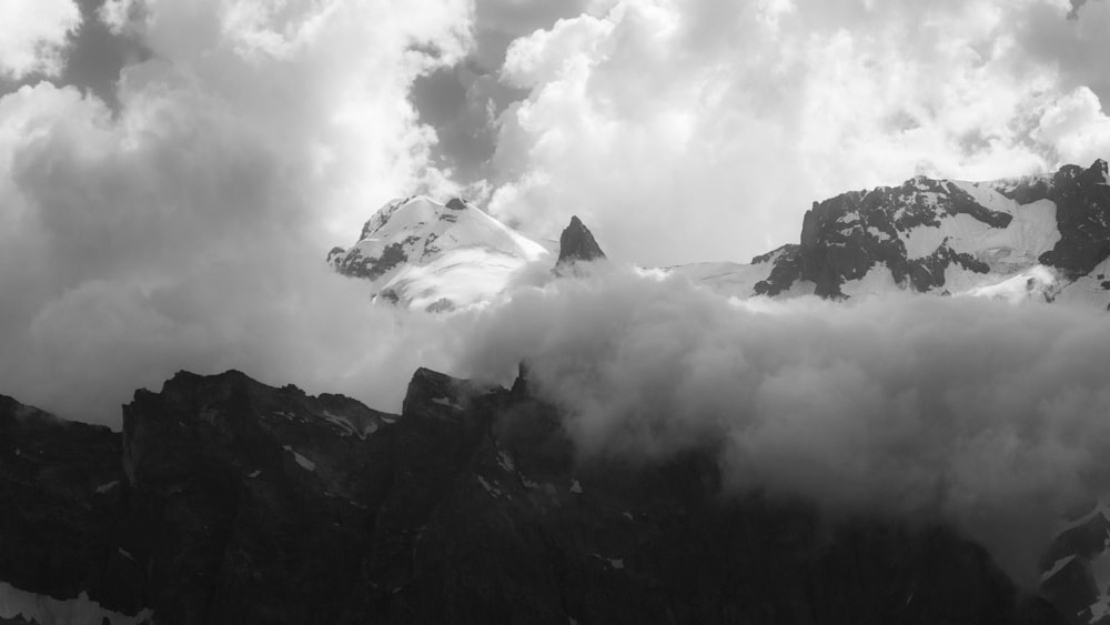 a mountain with clouds