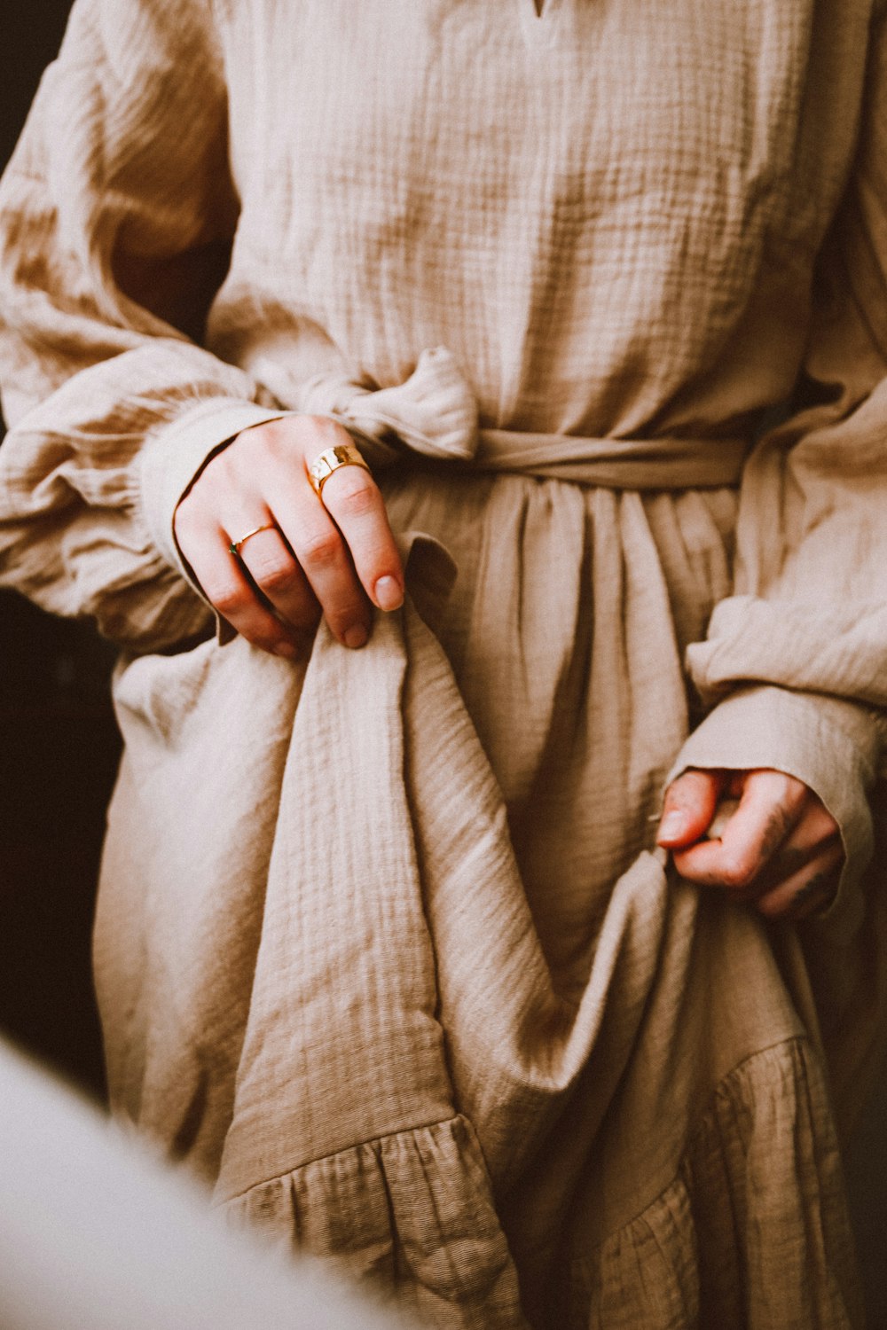 a person wearing a white dress