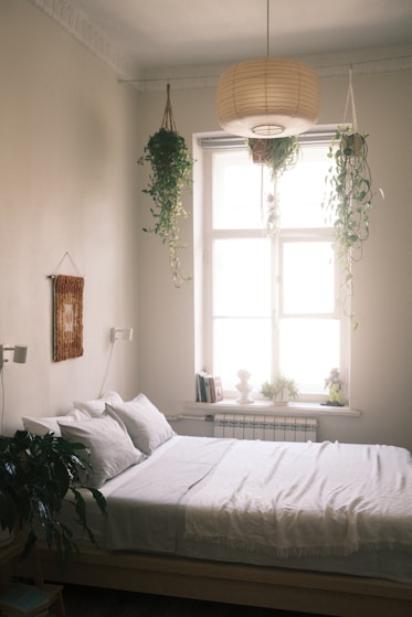 a bed with a lamp on it