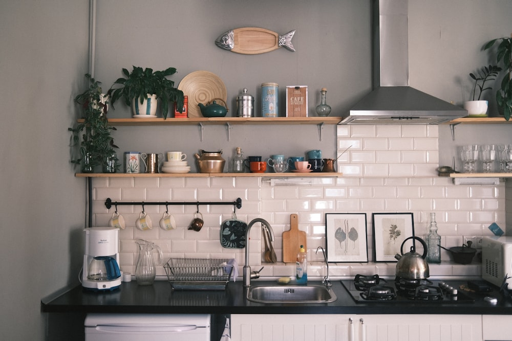 a kitchen with a shelf and shelves