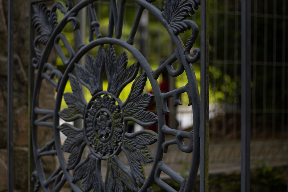 a metal gate with a metal fence
