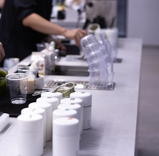 a table with glasses and bottles