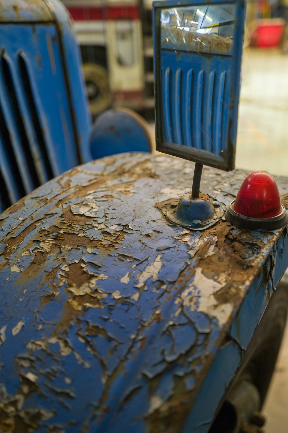 a rusted blue metal object