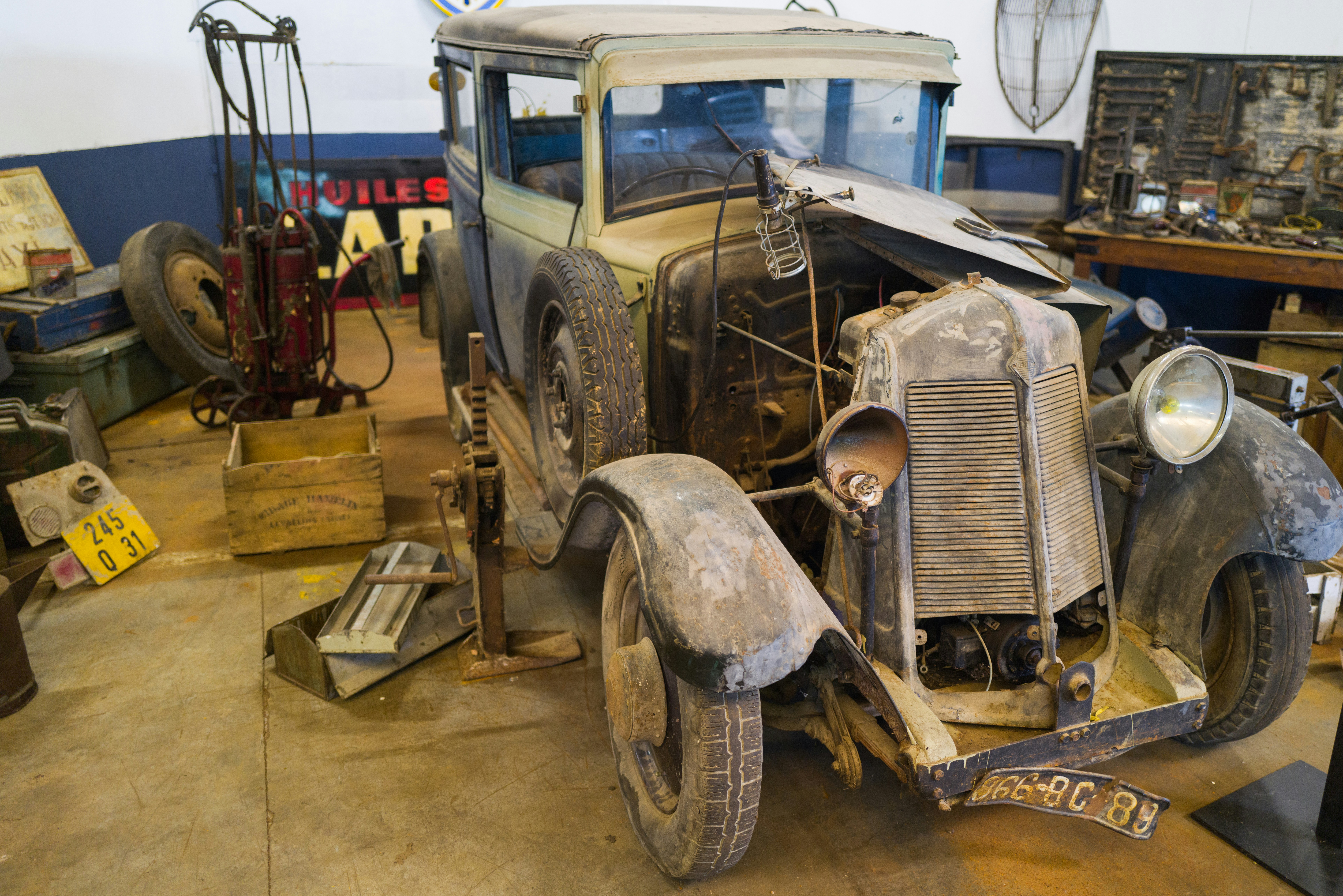 an old car in a shop