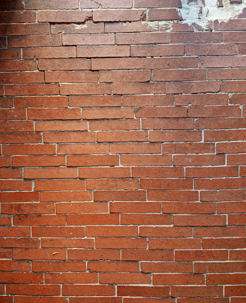 a brick wall with a hole in it