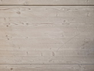 a piece of wood with writing on it