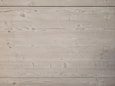 a piece of wood with writing on it