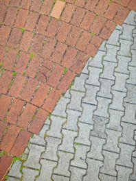 a brick walkway with a brick path