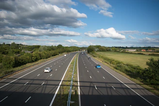 a highway with cars on it