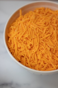 a bowl of freeze dried cheddar cheese