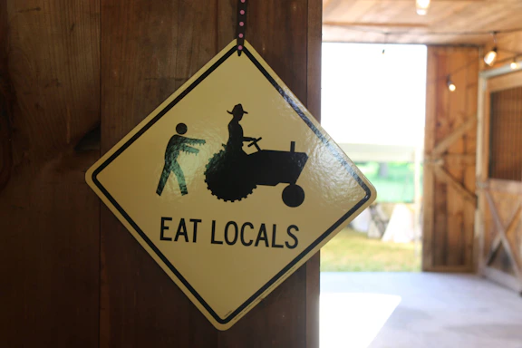 a sign on a wooden wall