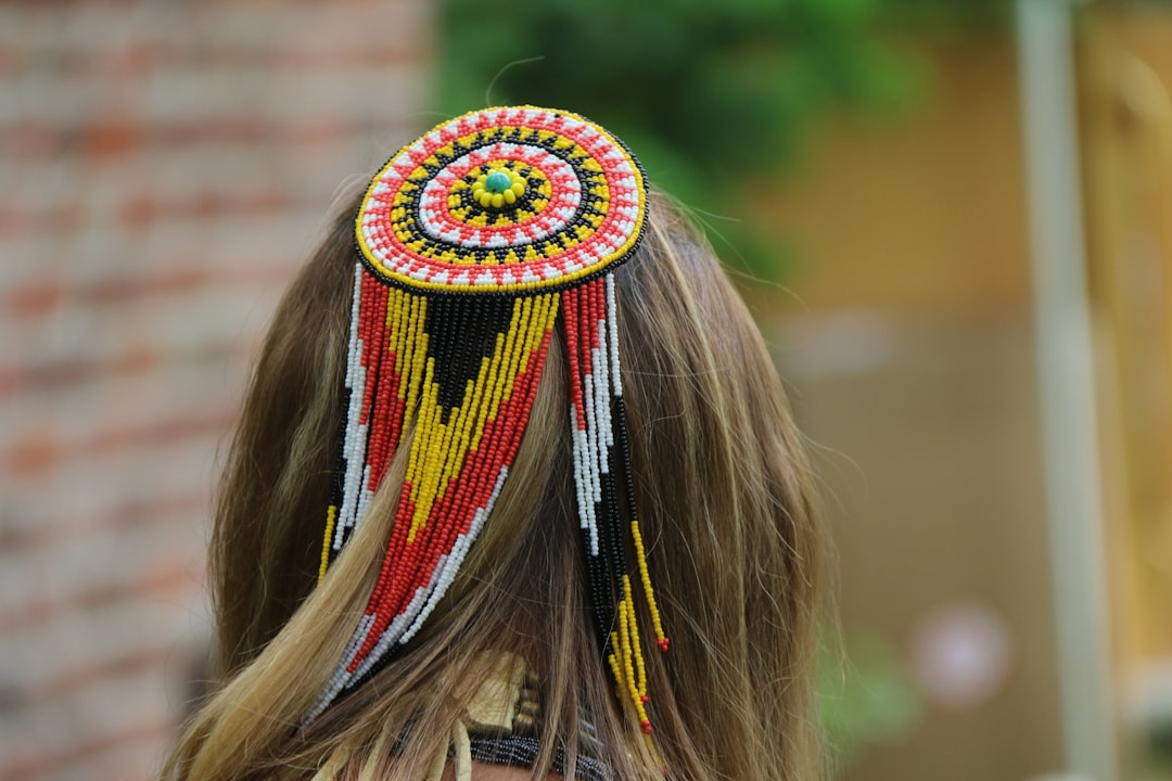 a woman with a colorful hat,