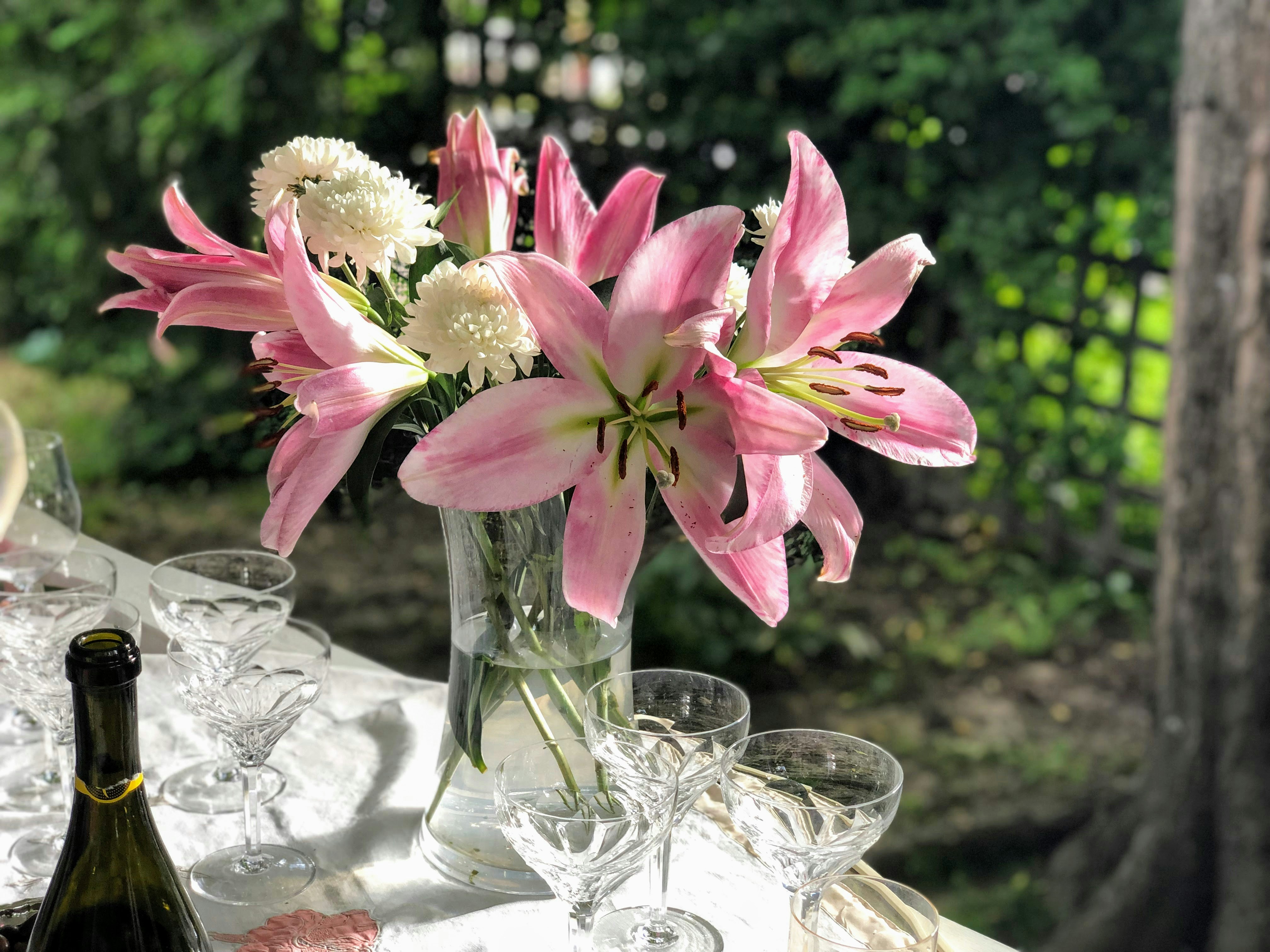 a vase with pink flowers