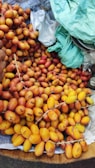 A vibrant assortment of fresh dates displayed in baskets.
